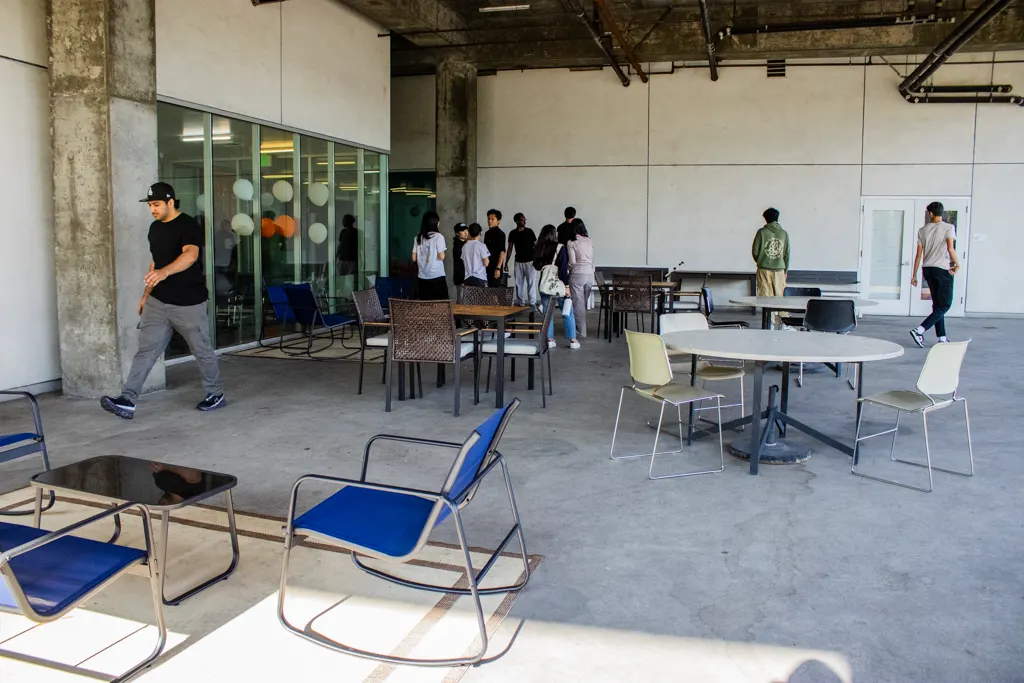 A renovated outdoor seating area with new furniture